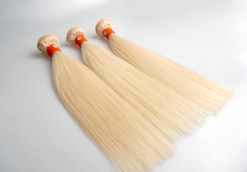 Three bundles of 613 blonde hair with orange lines
