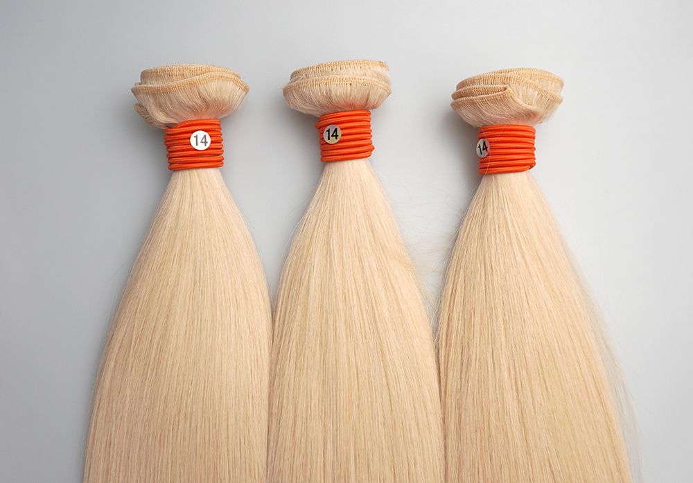 Bleaching to 613: Three bundles of 613 blonde hair with orange lines